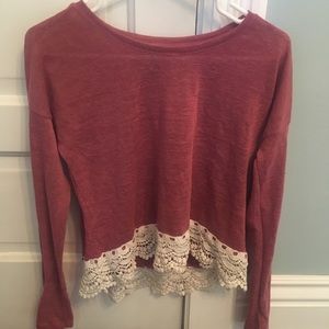 Deep pink light sweater with lace on bottom